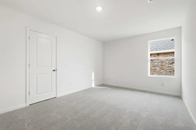 a big room with windows and closet