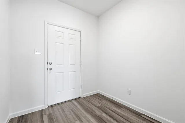 a view of small space with wooden floor