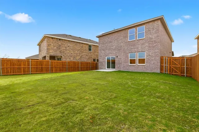 a view of yard with swimming pool
