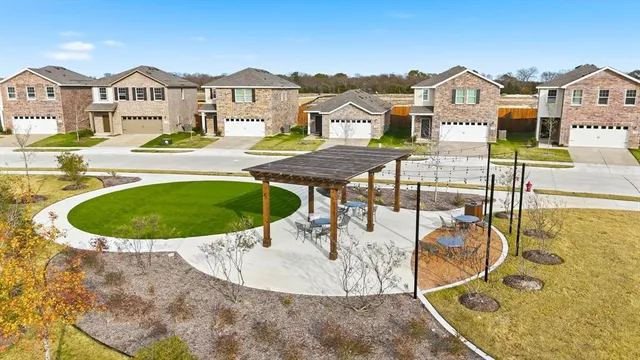view of a swimming pool with a outdoor seating