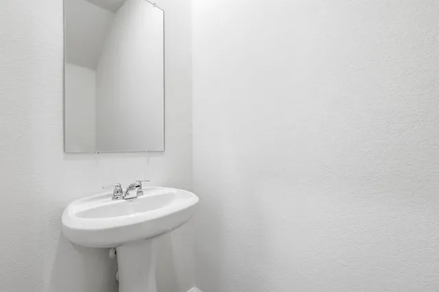 a sink with a mirror