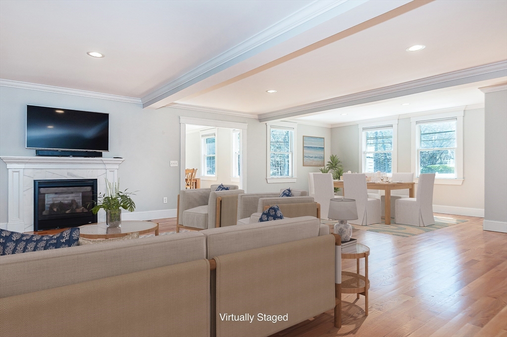 501 Point Road Marion, MA 02738 - Photo 12 of 42 a living room with furniture a fireplace and a flat screen tv