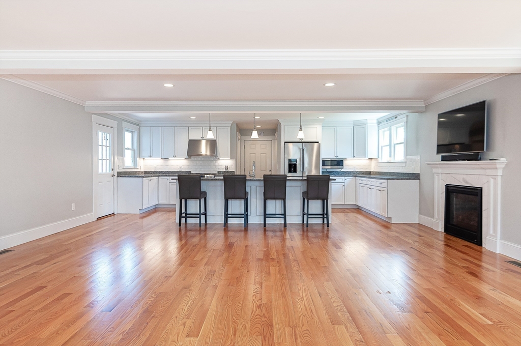 501 Point Road Marion, MA 02738 - Photo 13 of 42 a view of a dining room with furniture window and wooden floor