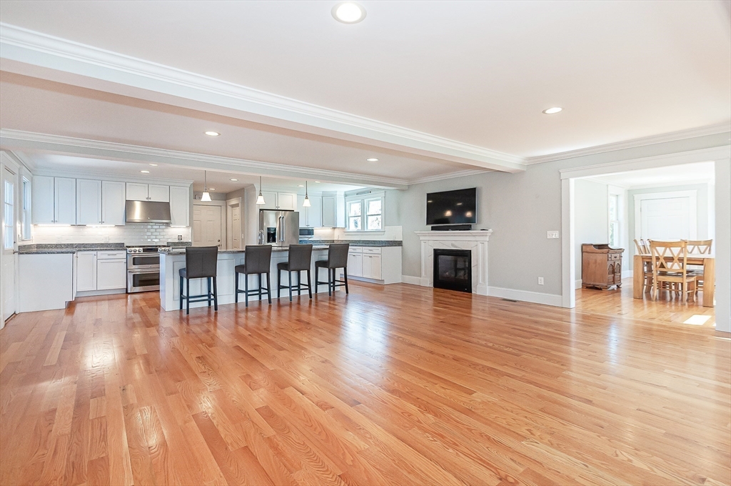 501 Point Road Marion, MA 02738 - Photo 14 of 42 a view of a living room kitchen with furniture and wooden floor
