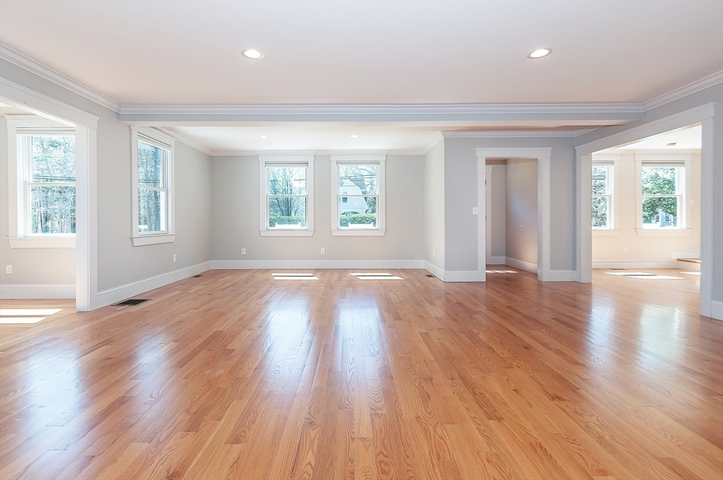 501 Point Road Marion, MA 02738 - Photo 15 of 42 an empty room with wooden floor and windows