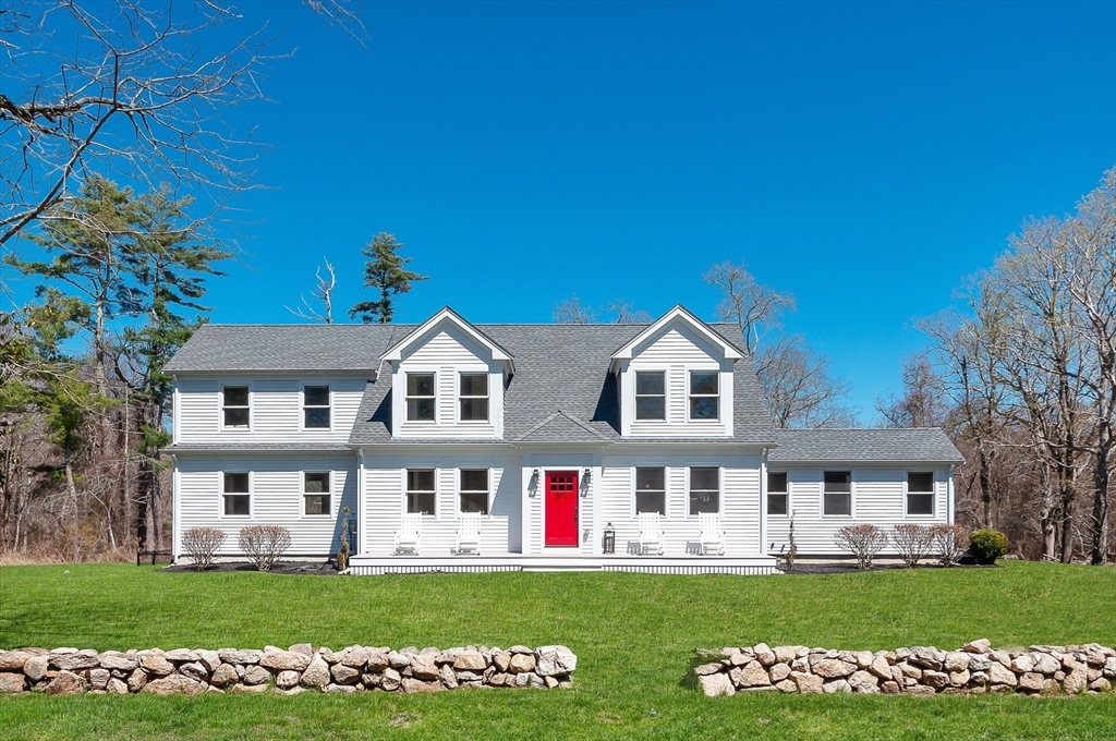 501 Point Road Marion, MA 02738 - Photo 2 of 42 a view of a white house with a big yard and potted plants and large trees
