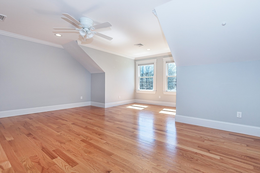 501 Point Road Marion, MA 02738 - Photo 24 of 42 a view of an empty room with wooden floor and a window
