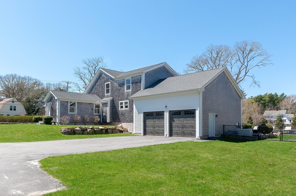 501 Point Road Marion, MA 02738 - Photo 40 of 42 a front view of house with yard and green space