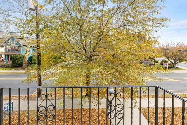 a view of a balcony with an outdoor space