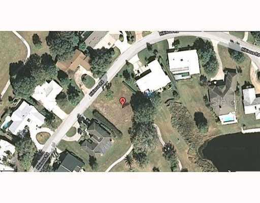 11 Hibiscus Road Belleair, FL 33756 - Photo 1 of 1 an aerial view of a house with a outdoor space