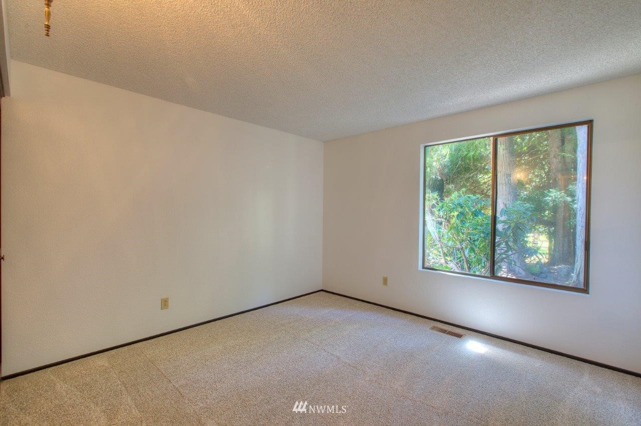 22004 Southeast Bain Road Renton, WA 98058 - Photo 14 of 27 an empty room with windows