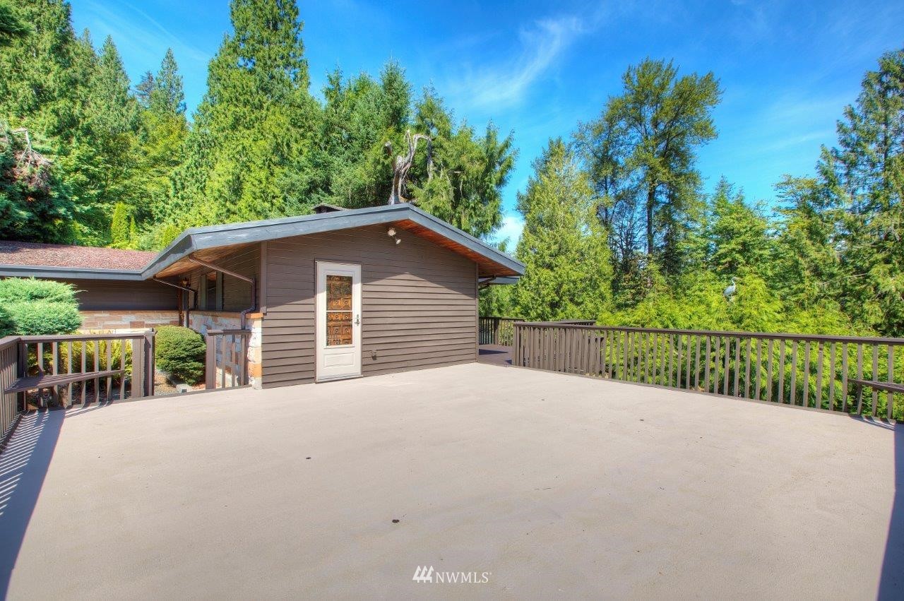 22004 Southeast Bain Road Renton, WA 98058 - Photo 18 of 27 a house with a yard