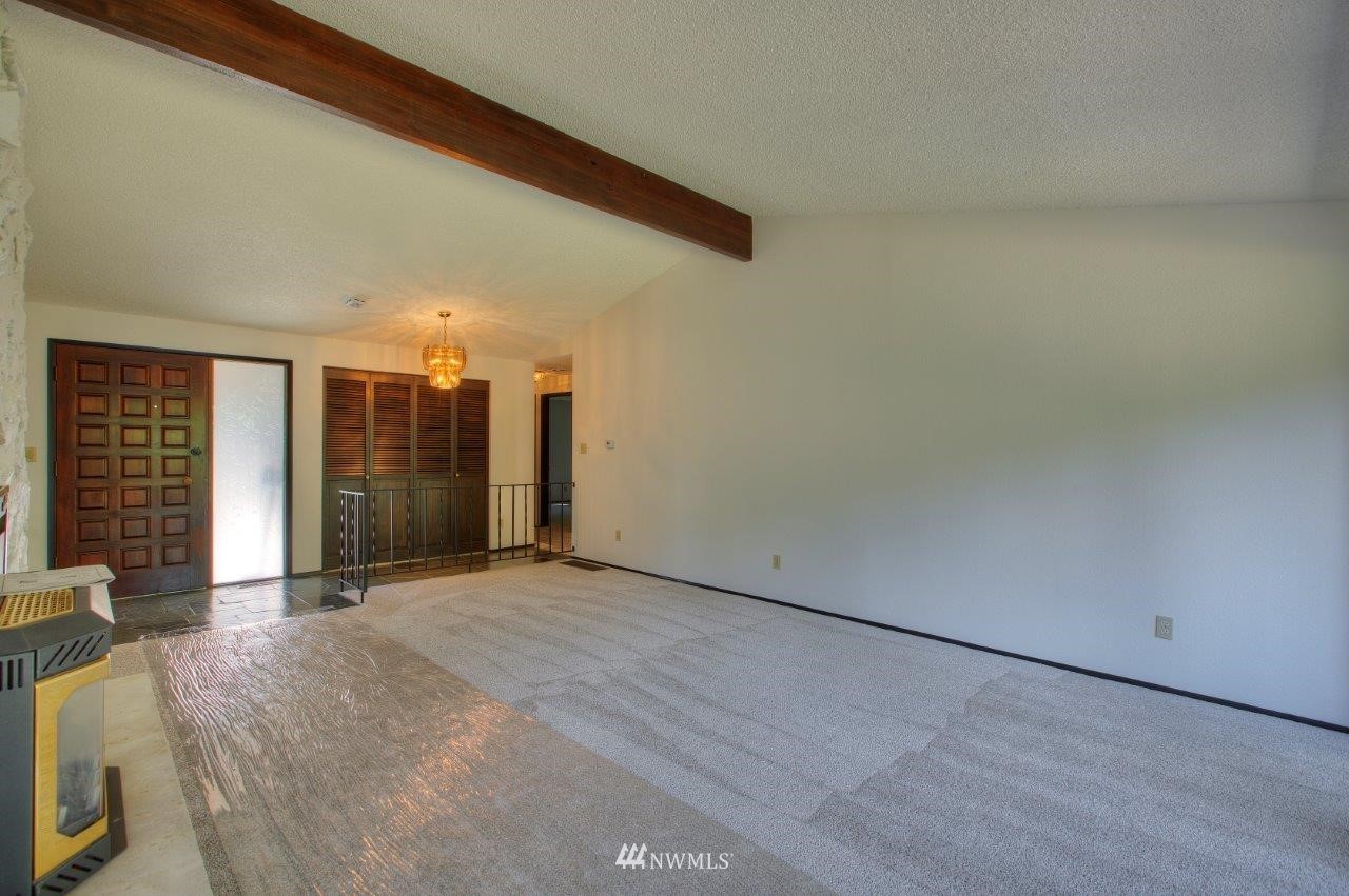 22004 Southeast Bain Road Renton, WA 98058 - Photo 3 of 27 a view of an empty room with a window