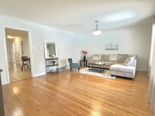 a kitchen with appliances cabinets and a sink