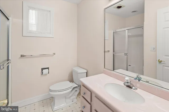 a view of a door and chair in the patio