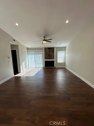 a living room with a fireplace