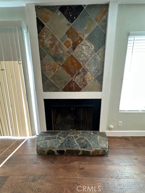 44649 La Paz Road, Unit F Temecula, CA 92592 - Photo 13 of 23 a living room with a fireplace