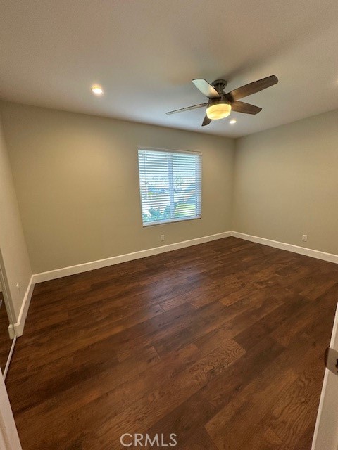 44649 La Paz Road, Unit F Temecula, CA 92592 - Photo 20 of 23 an empty room with wooden floor and windows