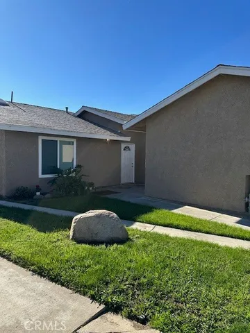 a view of backyard with potted plants