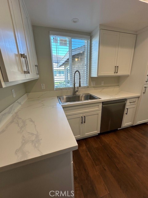 44649 La Paz Road, Unit F Temecula, CA 92592 - Photo 8 of 23 a kitchen with sink and cabinets