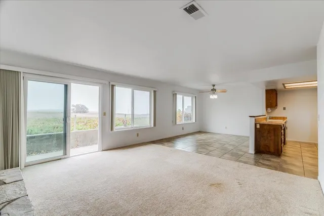 a view of a livingroom with a staircase