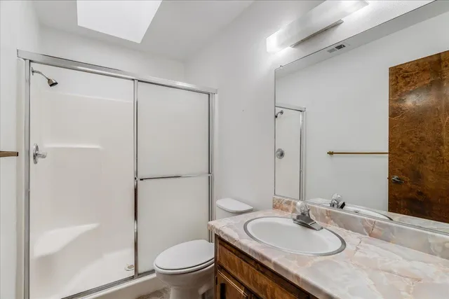 a picture of a room with a large white wall