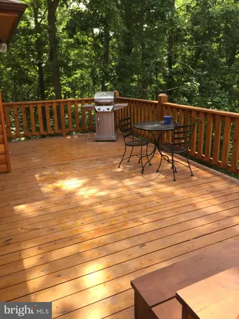 a view of swimming pool with seating space