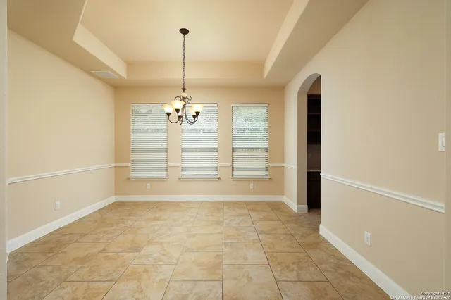 a view of a room with a chandelier