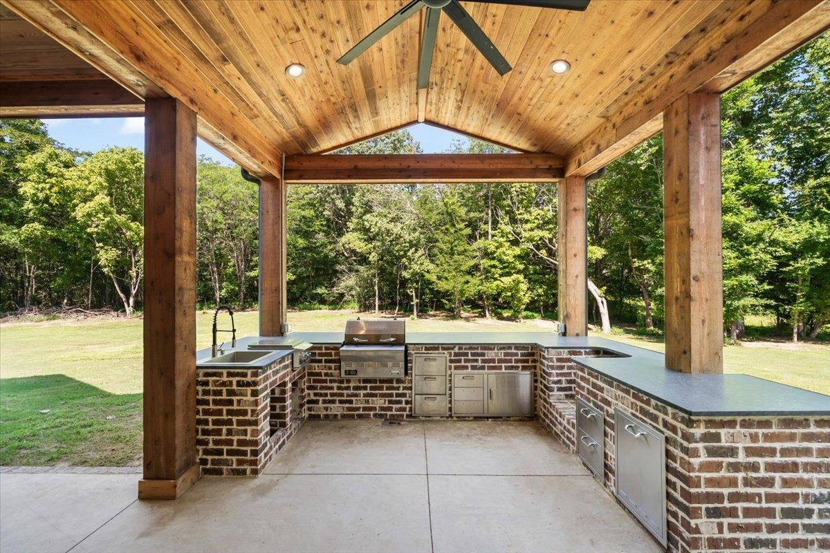 211 South Collierville Arlington Road Collierville, TN 38017 - Photo 37 of 40 View of patio featuring an outdoor kitchen and ceiling fan