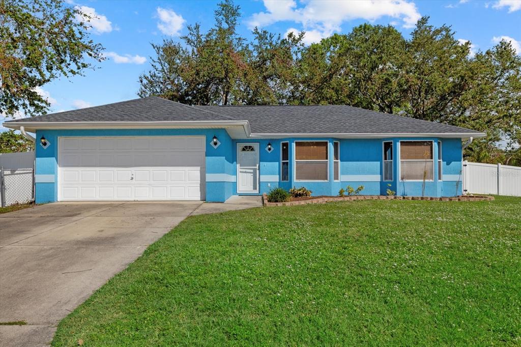 2985 Concord Road Venice, FL 34293 - Photo 1 of 1 a front view of house with yard and green space