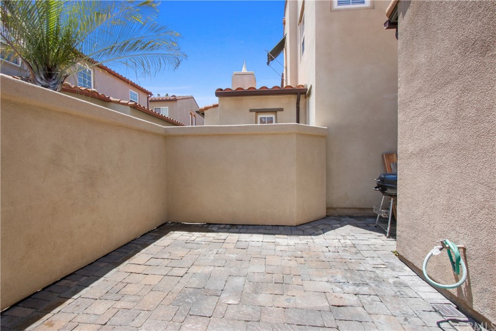10 Alevera Irvine, CA 92618 - Photo 19 of 22 a view of a room with wooden floor