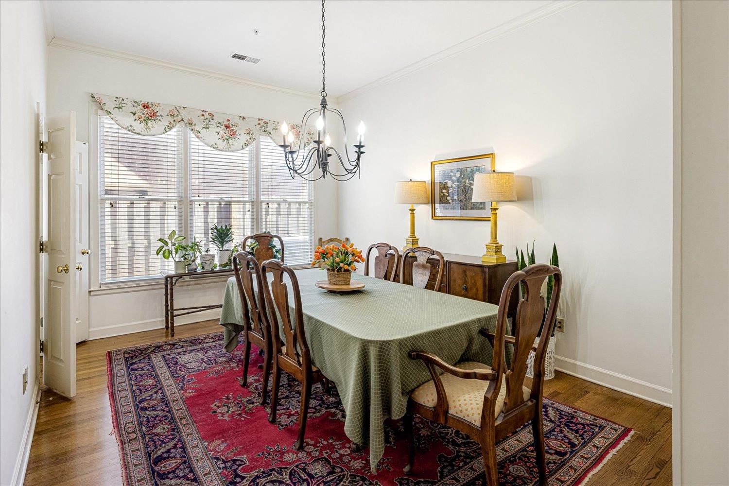 1727 Village Ridge Road Collierville, TN 38017 - Photo 14 of 33 a view of a dining room with furniture window and wooden floor