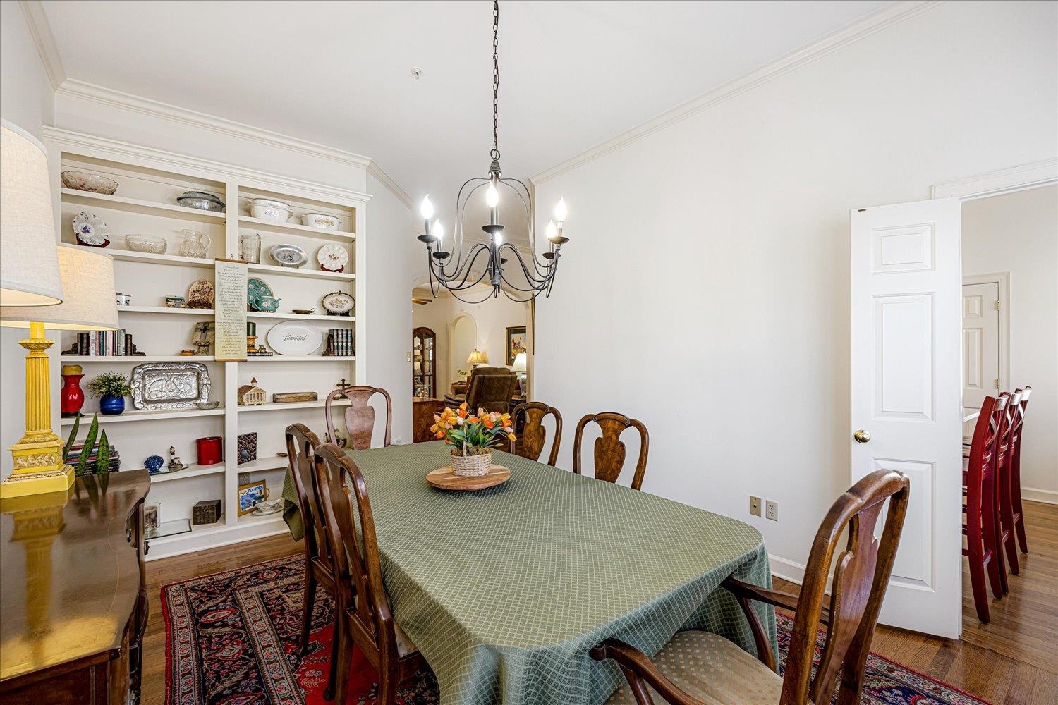 1727 Village Ridge Road Collierville, TN 38017 - Photo 15 of 33 a view of a dining room with furniture and chandelier