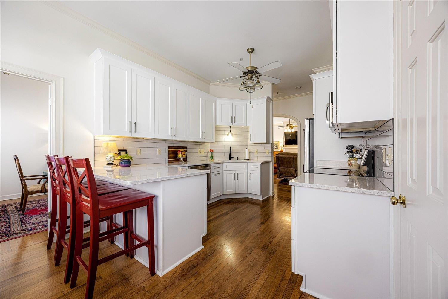 1727 Village Ridge Road Collierville, TN 38017 - Photo 17 of 33 a view of kitchen with cabinets and wooden floor