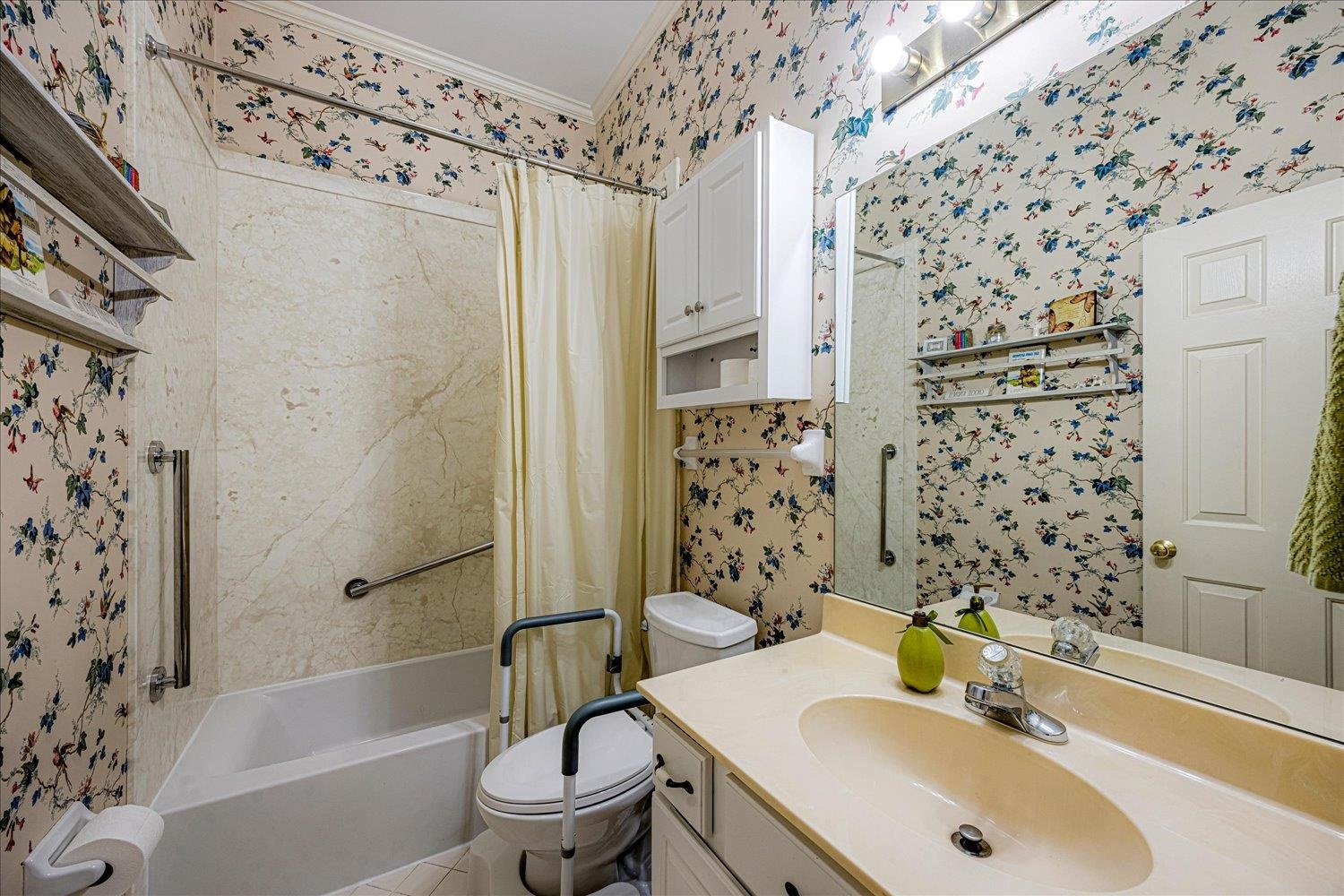 1727 Village Ridge Road Collierville, TN 38017 - Photo 20 of 33 a bathroom with a sink toilet and shower