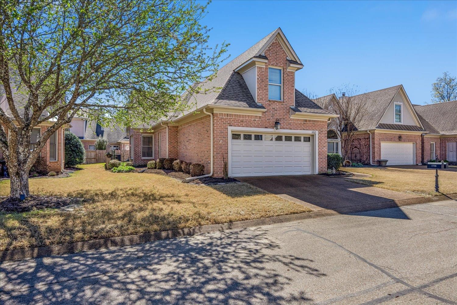 1727 Village Ridge Road Collierville, TN 38017 - Photo 24 of 33 a front view of a house with a yard