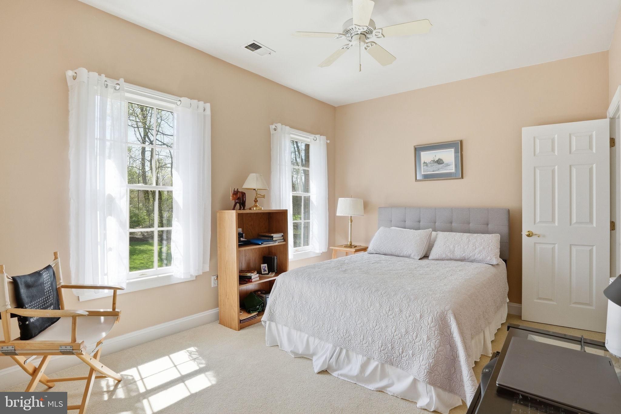 2012 Cortland Road Davidsonville, MD 21035 - Photo 33 of 55 a bedroom with a bed a chair and next to a window
