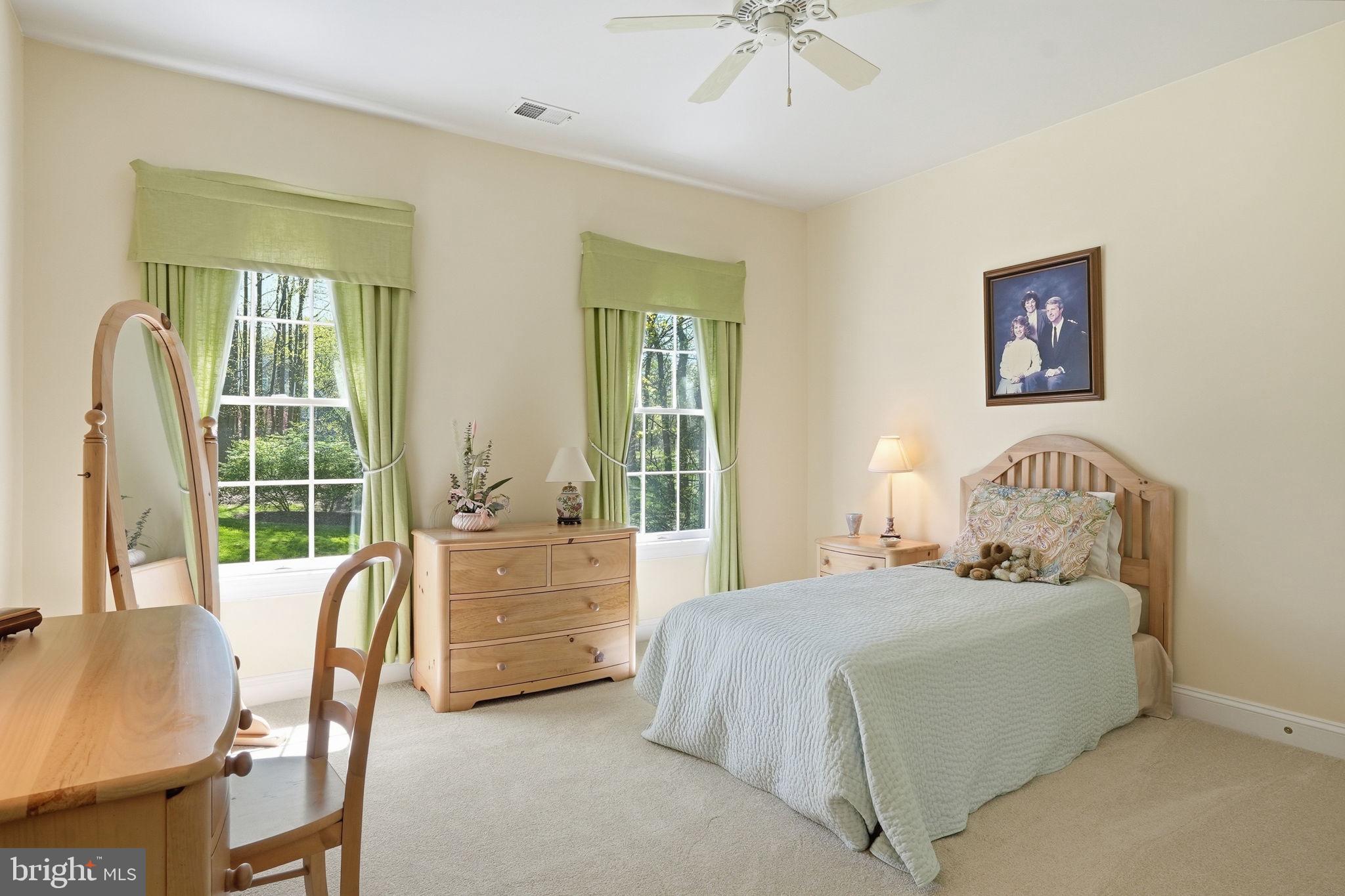 2012 Cortland Road Davidsonville, MD 21035 - Photo 37 of 55 a bedroom with a bed and a table