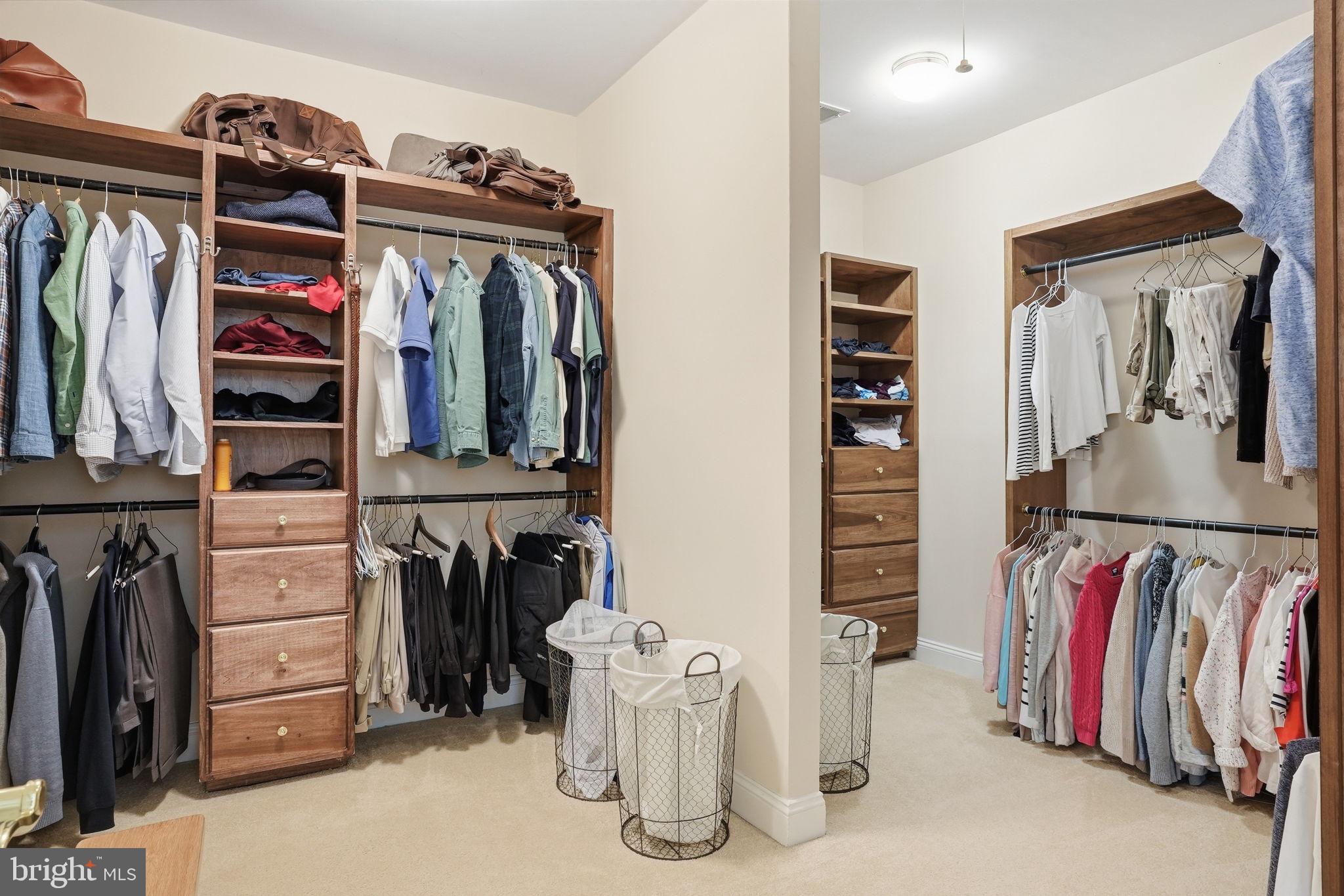 2012 Cortland Road Davidsonville, MD 21035 - Photo 40 of 55 a view of walk in closet with clothes and shoes