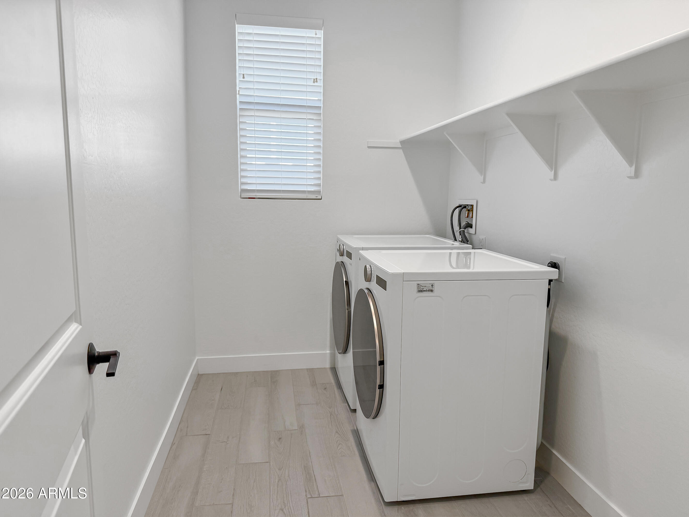 14843 West Sand Hills Road Surprise, AZ 85387 - Photo 9 of 40 Laundry Room