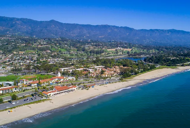 an aerial view of lake and residential houses