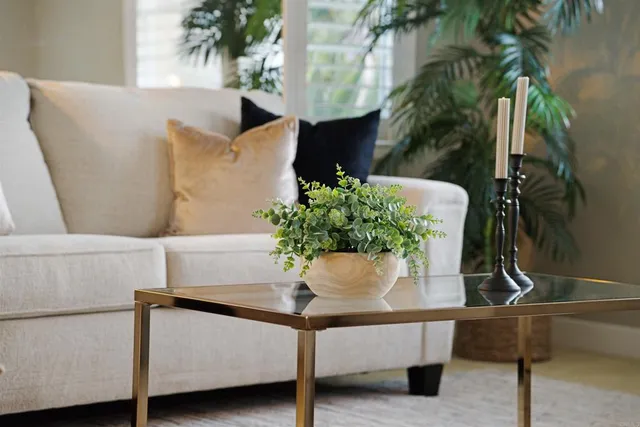 a bedroom with a bed and a mirror