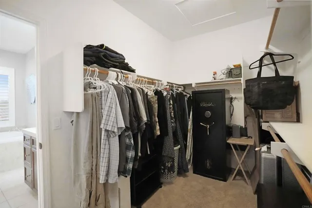a kitchen with a sink a stove and a microwave
