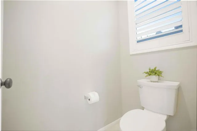 a view of an outdoor dining space with a table and chairs