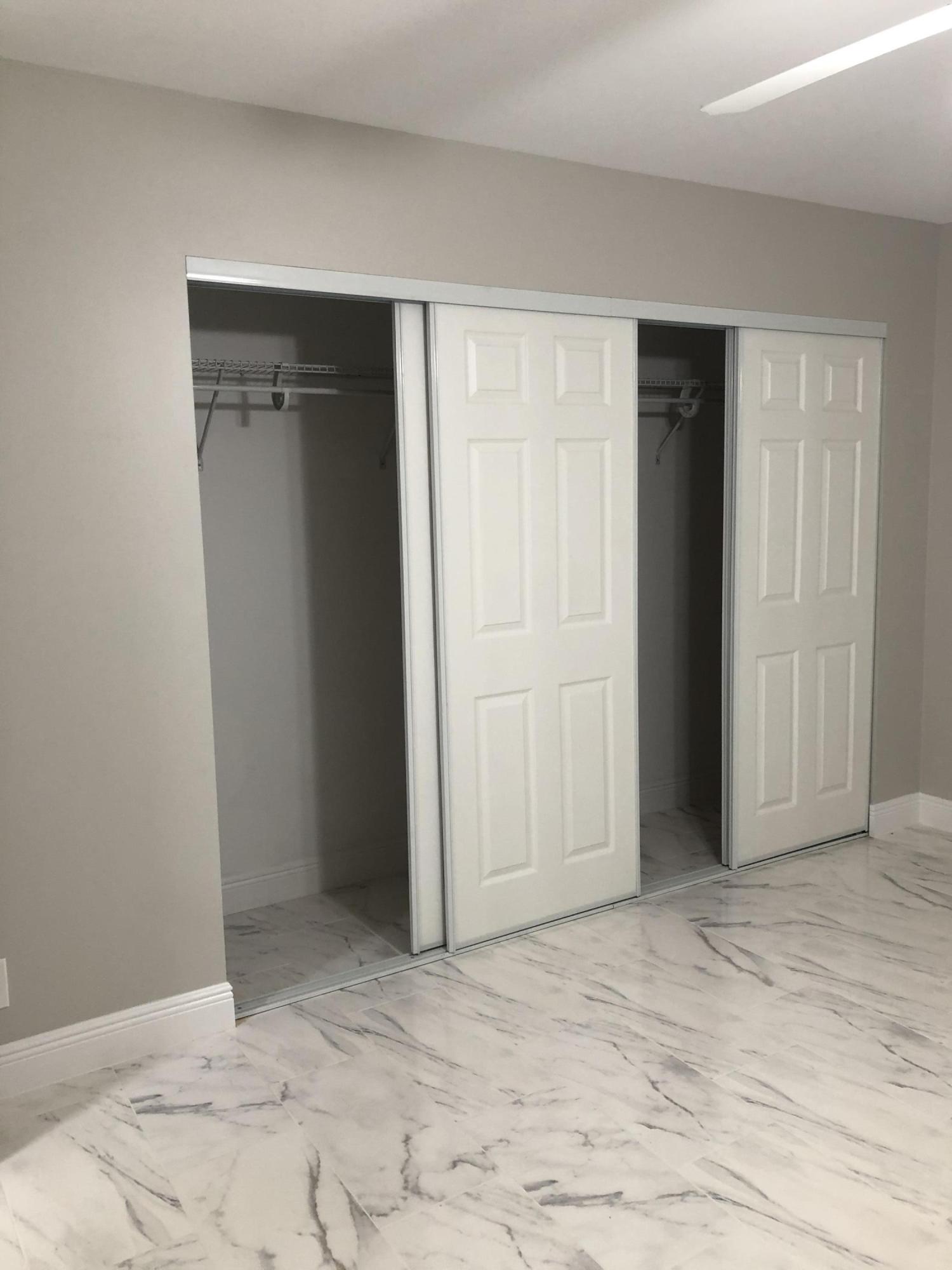 14140 Nesting Way Delray Beach, FL 33484 - Photo 11 of 40 Guest bdr closet