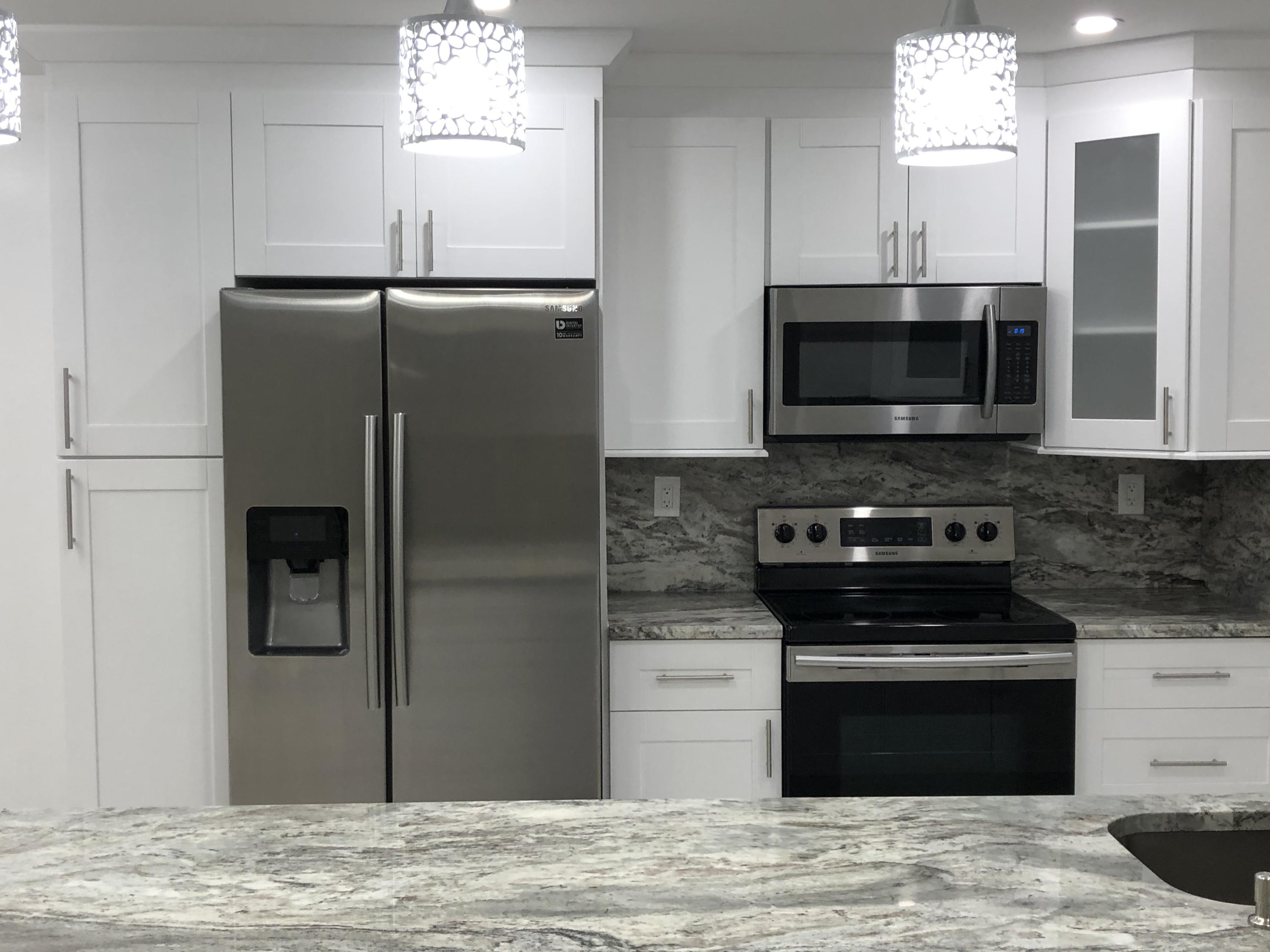14140 Nesting Way Delray Beach, FL 33484 - Photo 4 of 40 kitchen
