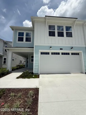 a front view of a house with yard