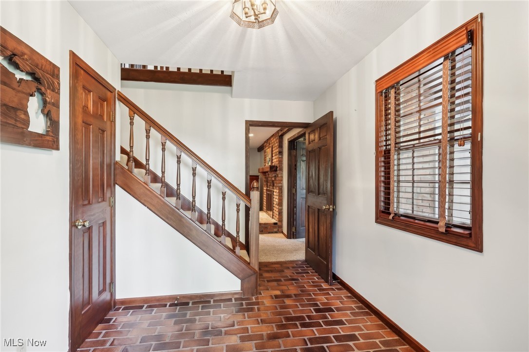 16737 Claridon Troy Road Burton, OH 44021 - Photo 5 of 46 Entering the foyer from the front door you will see the quality in the woodwork , windows and doors