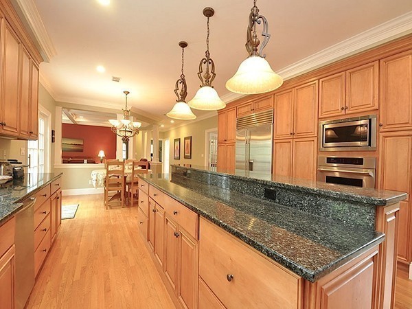 81 Montvale Road Weston, MA 02493 - Photo 16 of 27 a kitchen with stainless steel appliances granite countertop a sink dishwasher a oven with granite countertops and cabinets