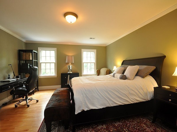 81 Montvale Road Weston, MA 02493 - Photo 25 of 27 a bedroom with a bed a chair and a large window